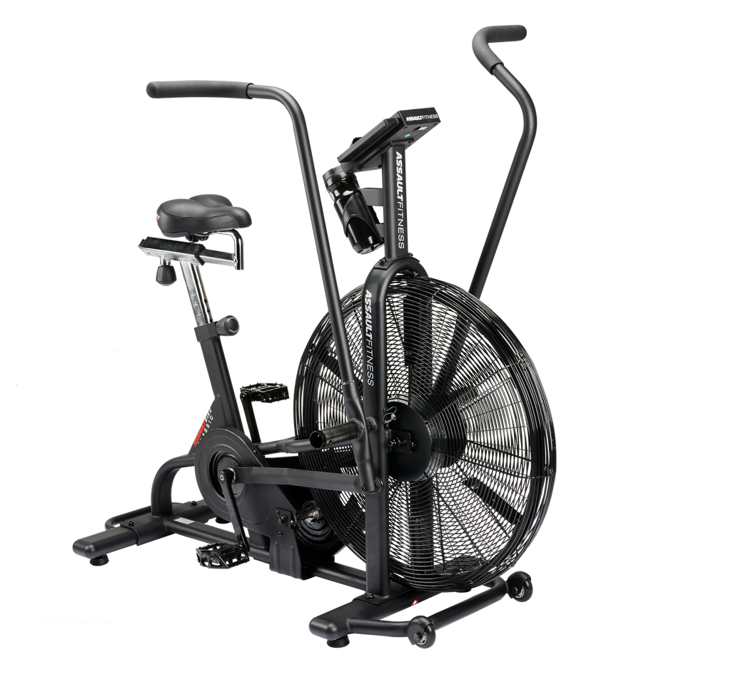 A black Assault Bike exercise machine with a large fan and adjustable seat and handlebar settings.